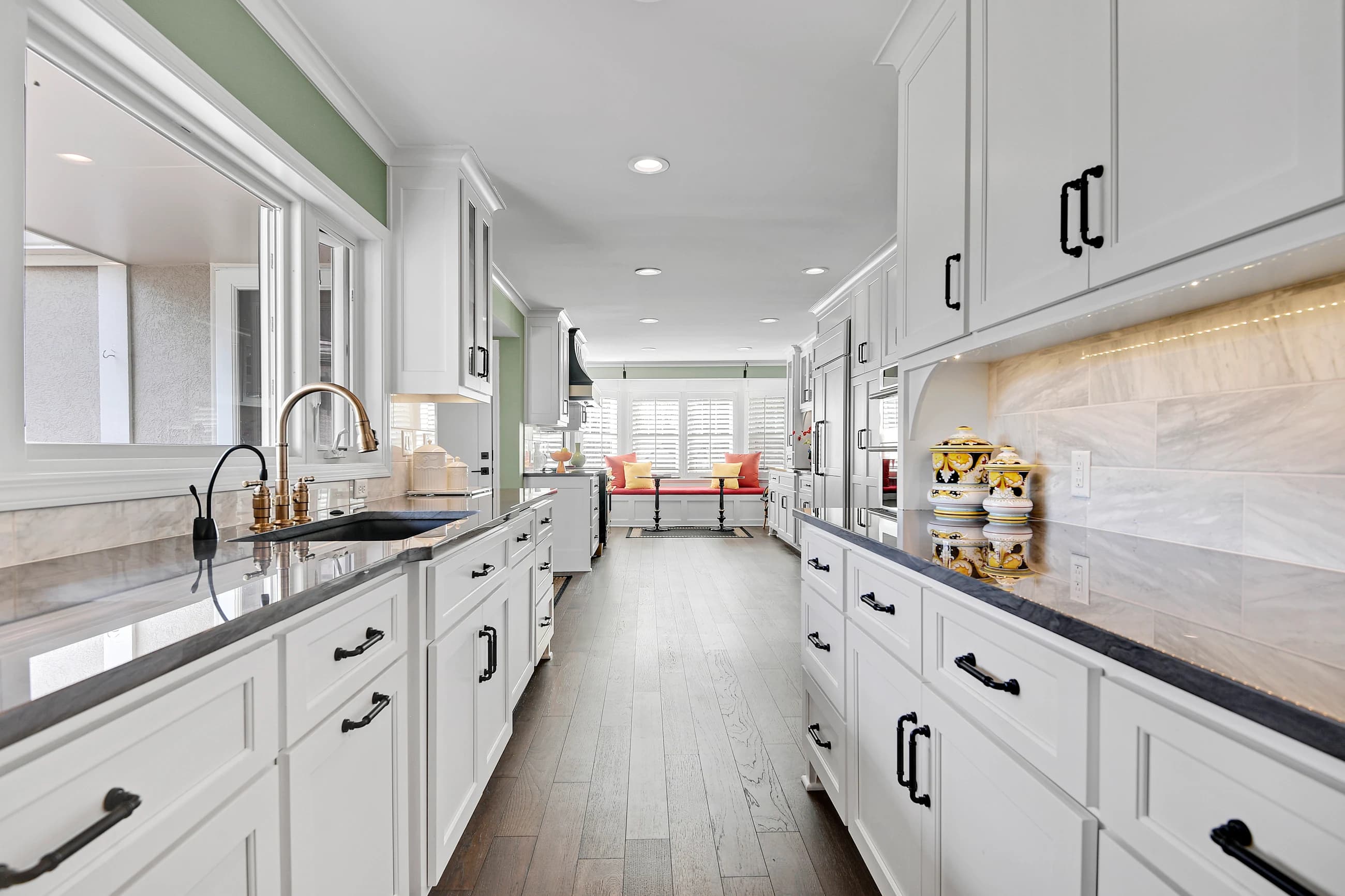 Bright white kitchen carefully styled for real estate listing photography