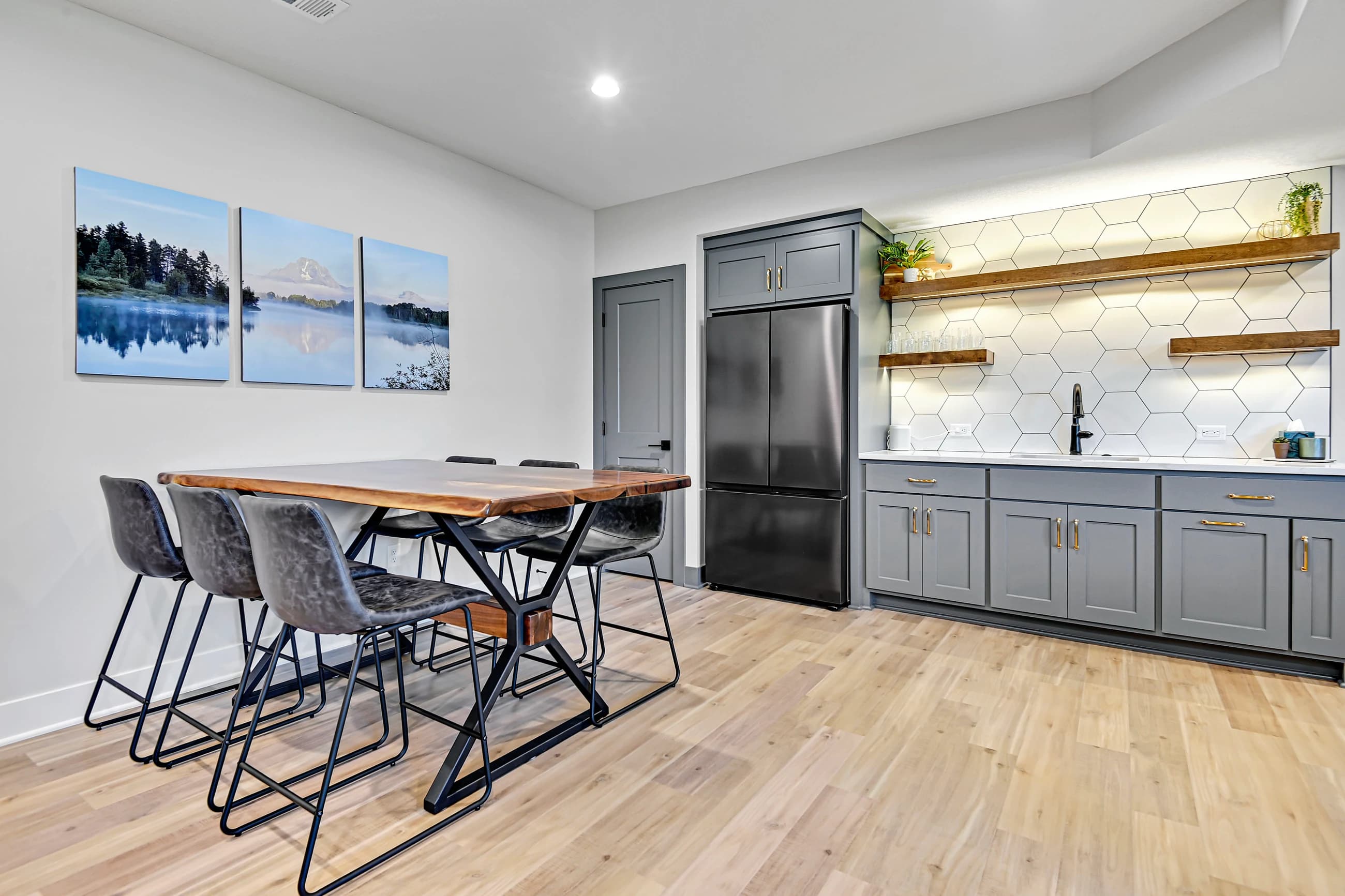 Clean dining and kitchenette area edited for a lighter listing presentation